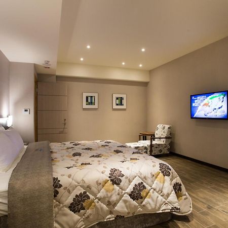 Verygood Business Hotel Huatan Kamer foto