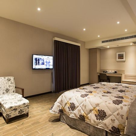 Verygood Business Hotel Huatan Kamer foto