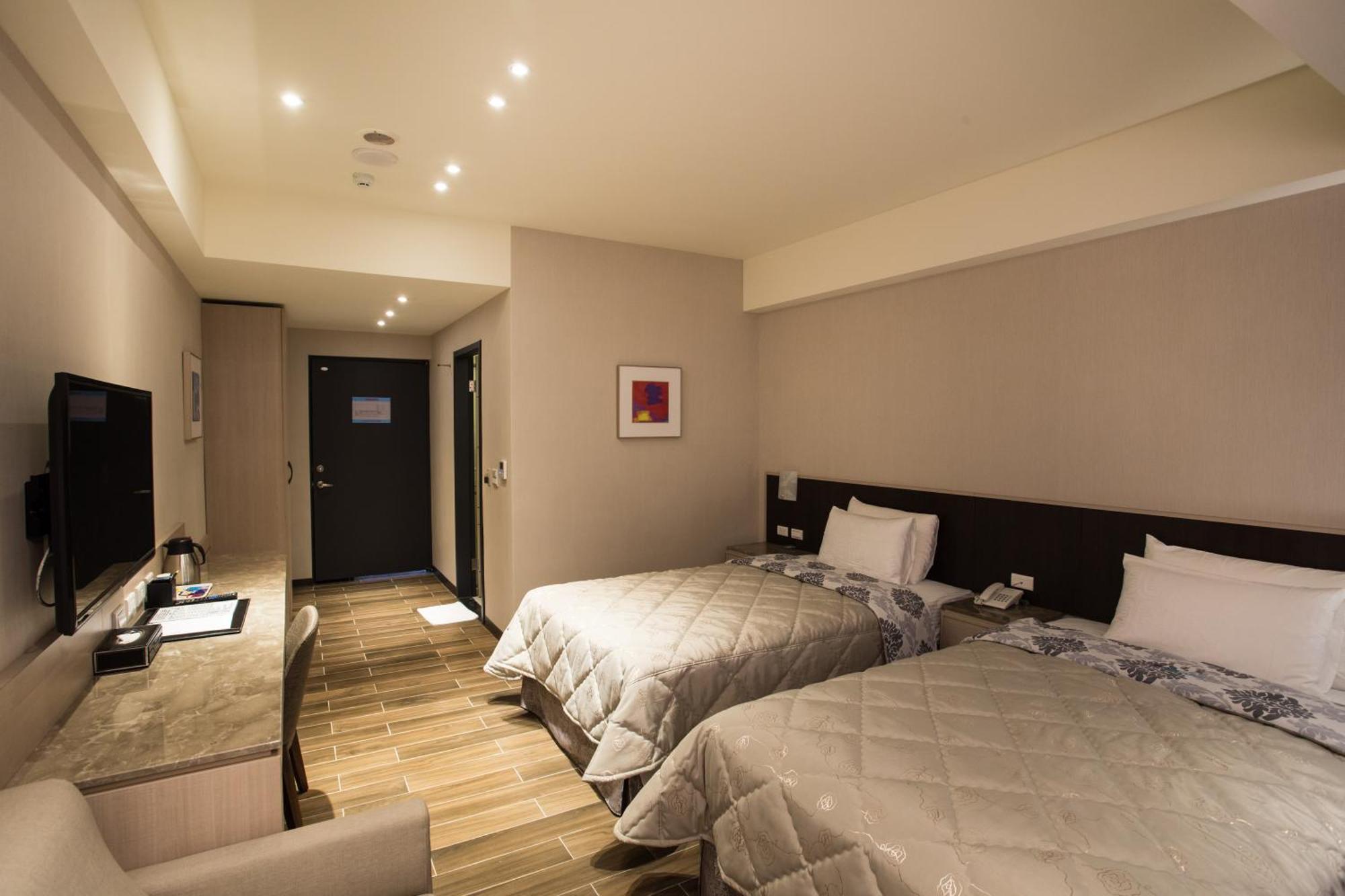 Verygood Business Hotel Huatan Kamer foto