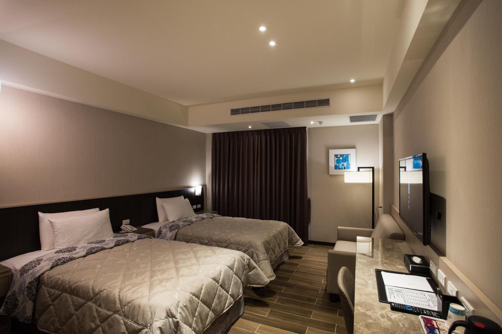 Verygood Business Hotel Huatan Kamer foto