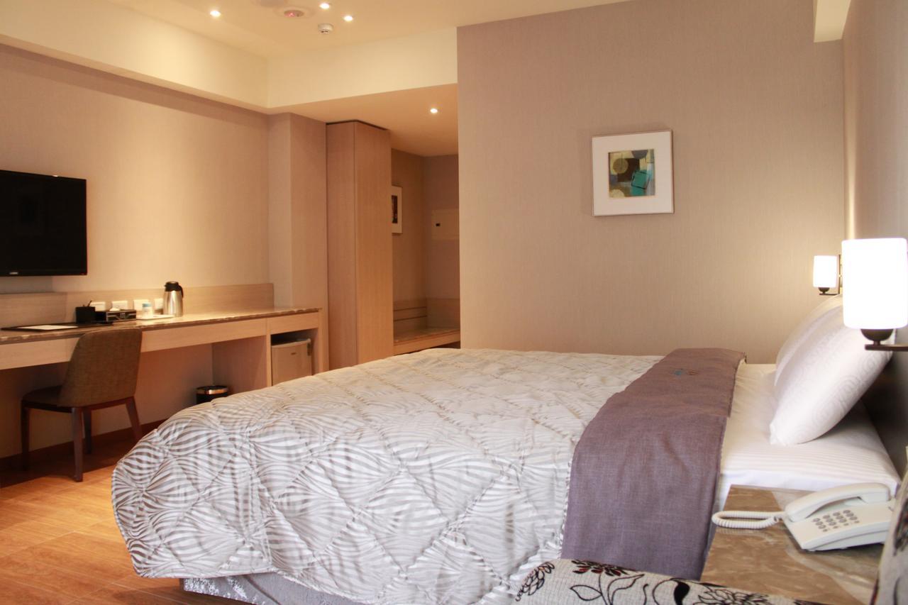 Verygood Business Hotel Huatan Buitenkant foto