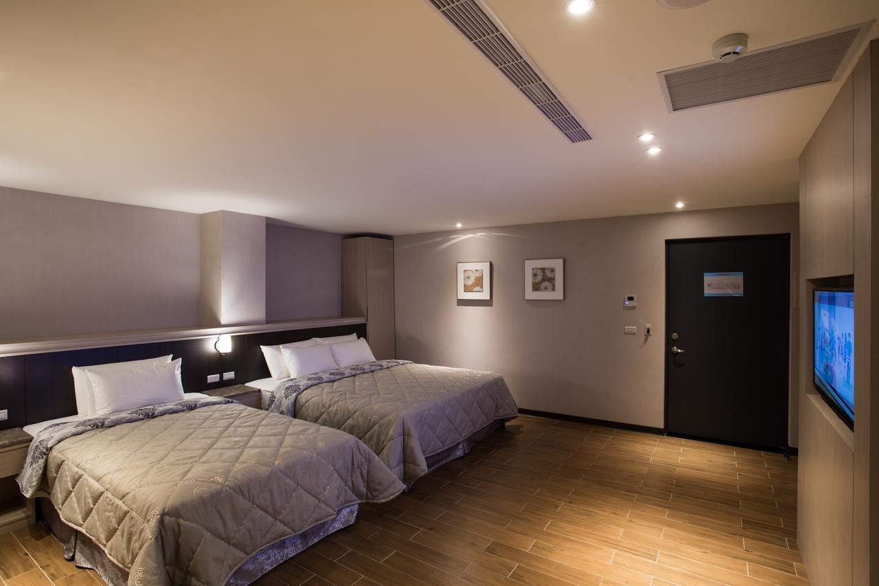 Verygood Business Hotel Huatan Kamer foto